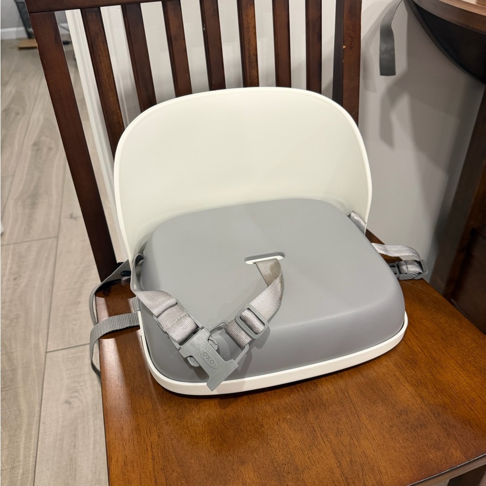 Oxo Tot foldable high chair with straps
